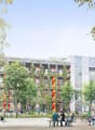 The image shows a modern residential complex with several multi-story buildings surrounded by trees and greenery. The buildings have balconies on the upper floors, and there is a central open space with people sitting at tables and benches, enjoying the o