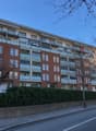 Residential apartment building with multiple floors and balconies