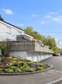 modern white house, raised ground floor, balcony, garden, parking place