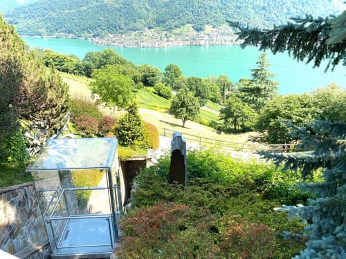 Vivere nel verde con tanta privacy e vista spettacolare a pochi passi da Lugano (1)