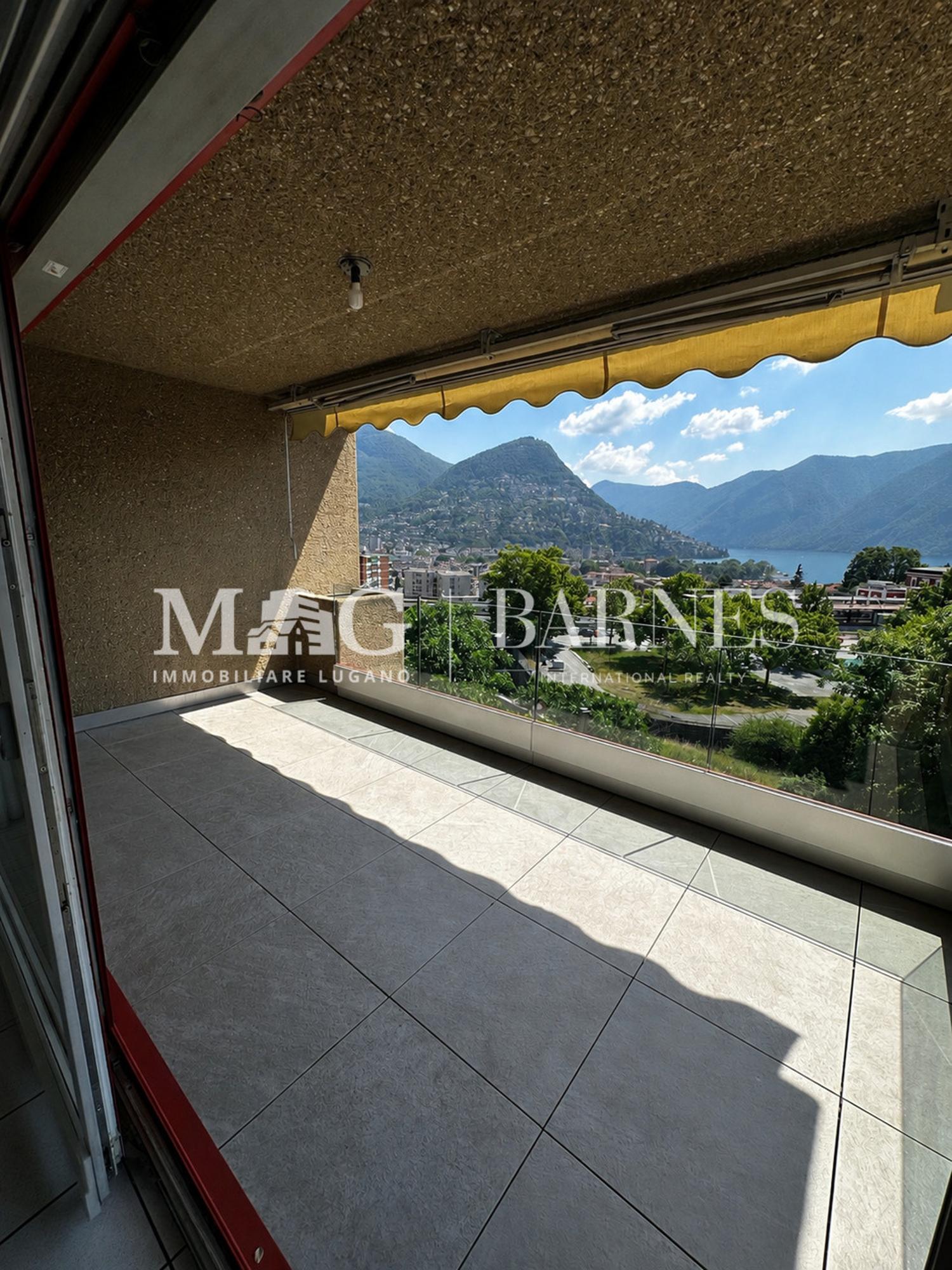 Lugano: Appartamento 2.5 locali centrale con balcone e box auto