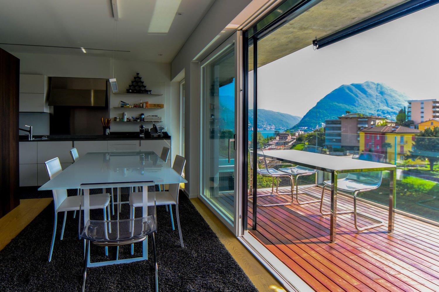 Attico vista lago con roof garden