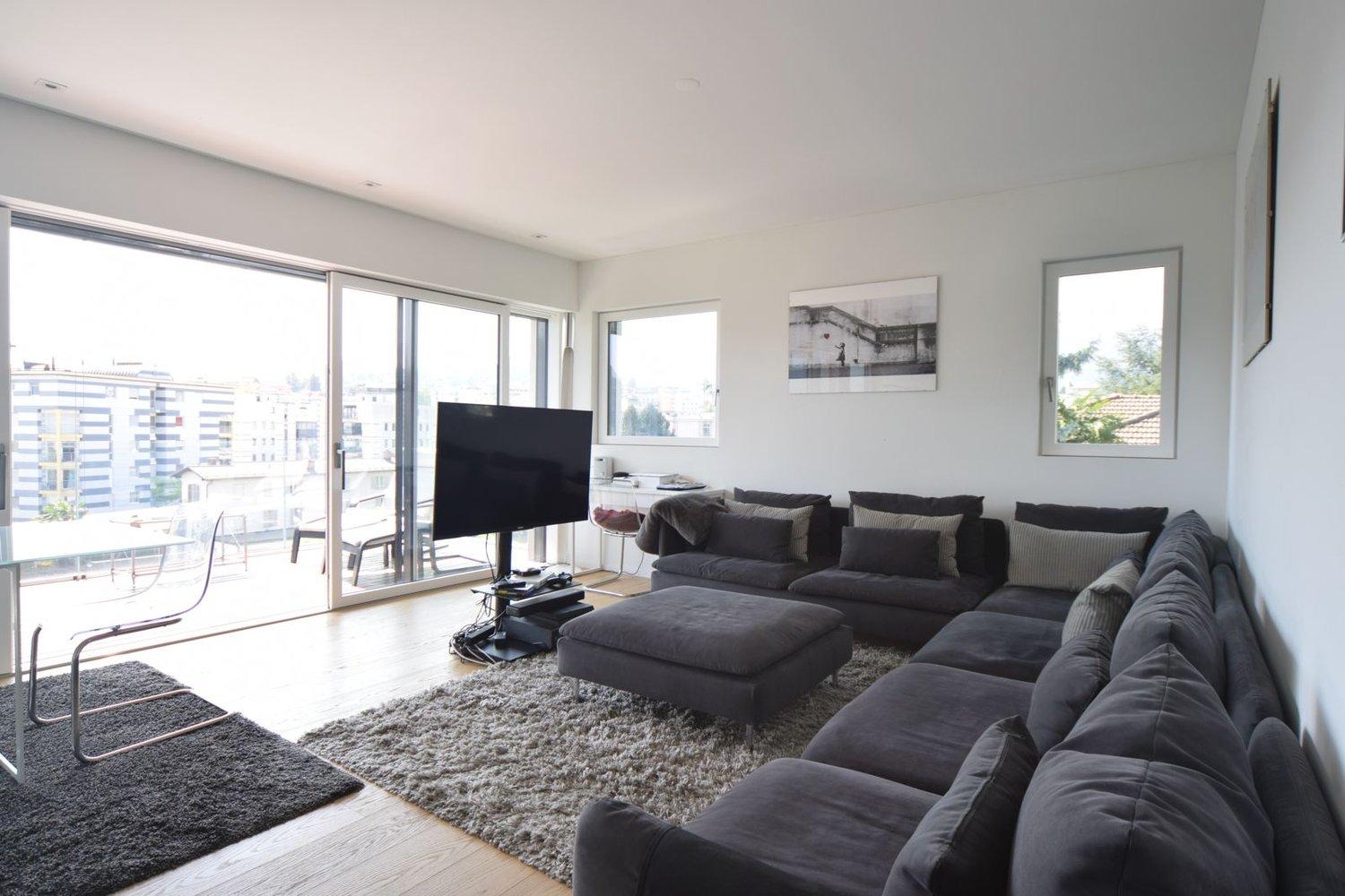 Attico vista lago con roof garden