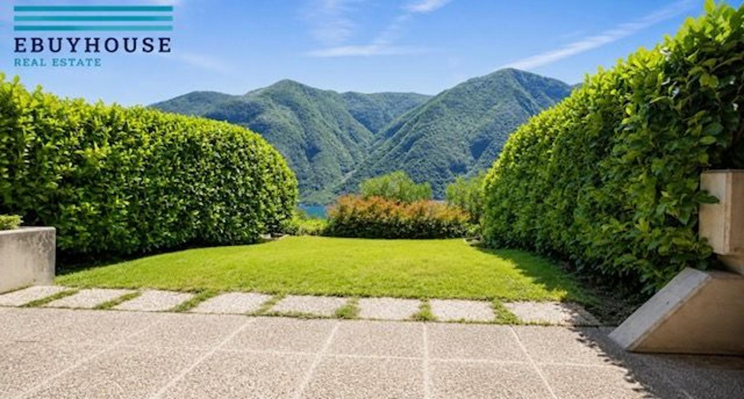 Villetta a schiera vista lago con giardino privato