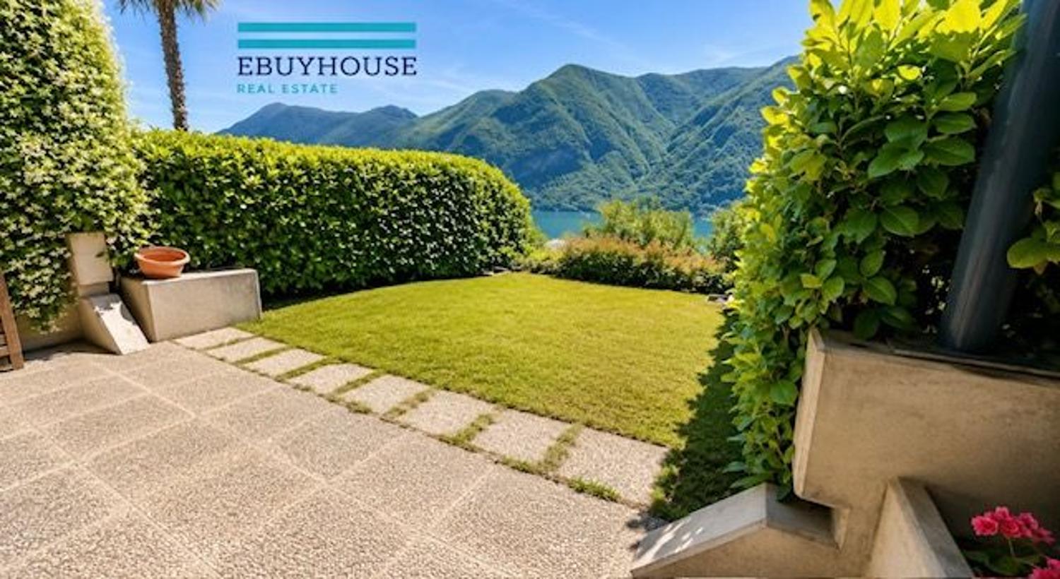 Villetta a schiera vista lago con giardino privato