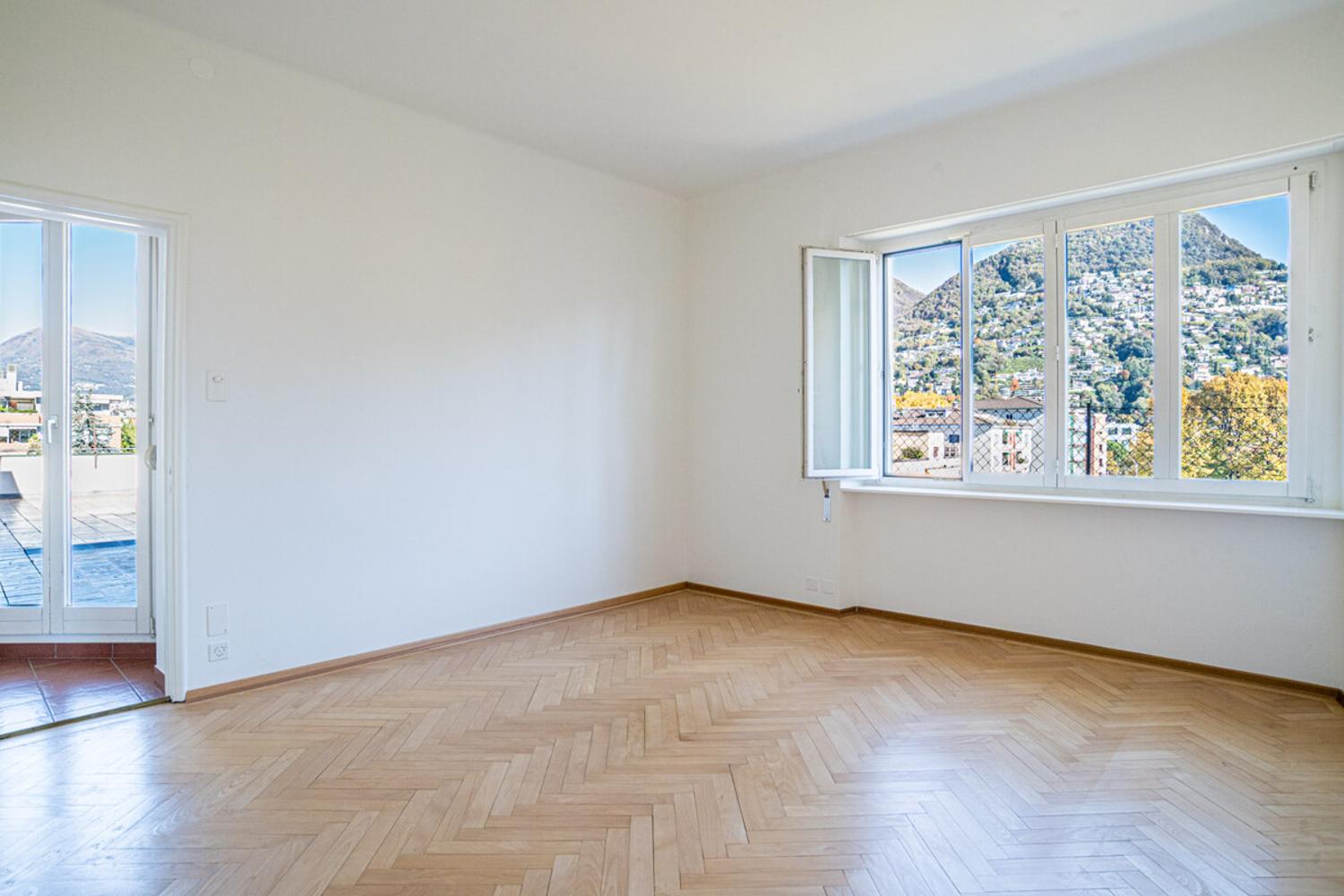 LUGANO ATTICO CON TERRAZZO TRA STORIA E ARTE