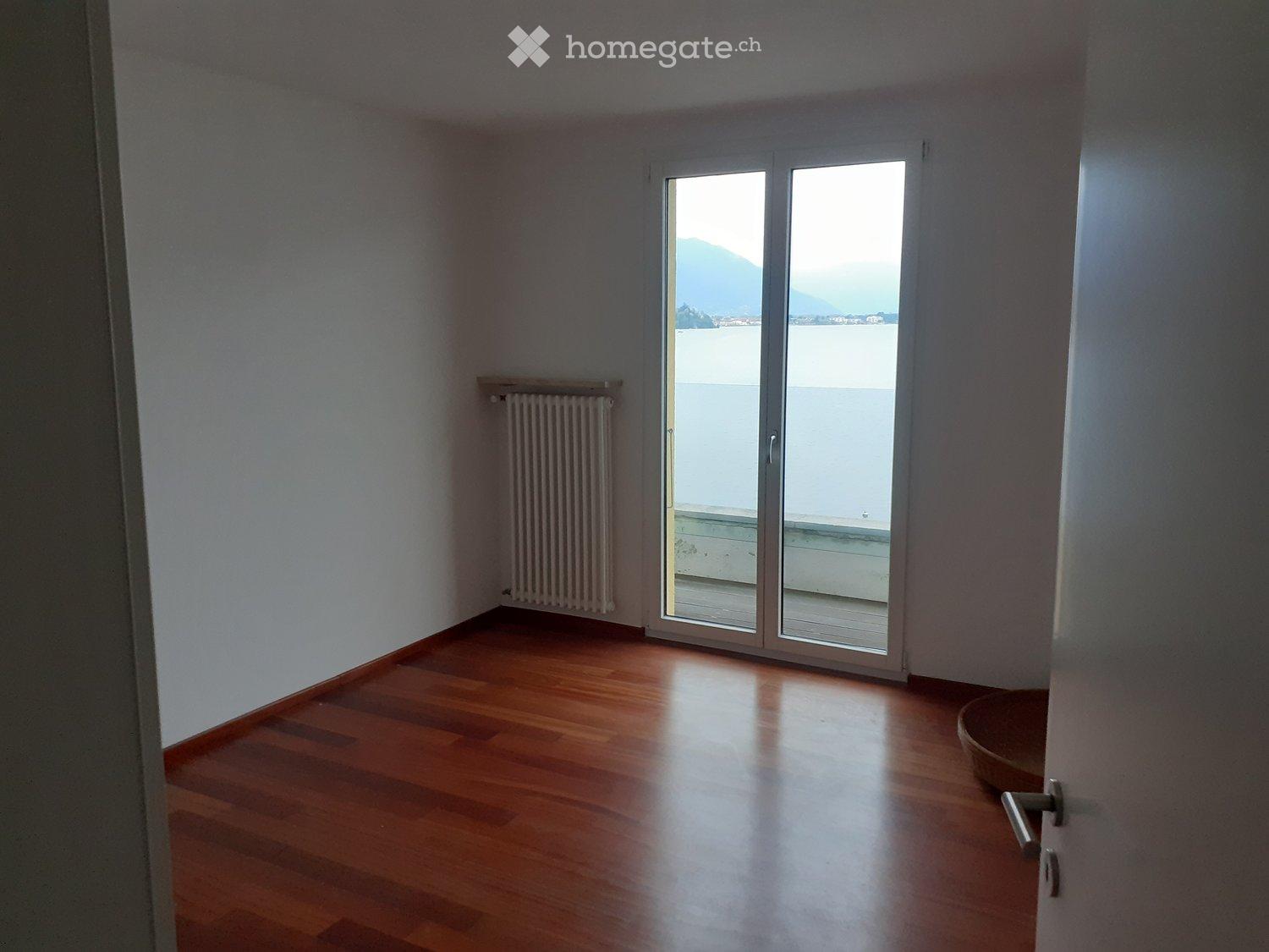 Splendido duplex di 4 locali con vista lago a Porto Ronco