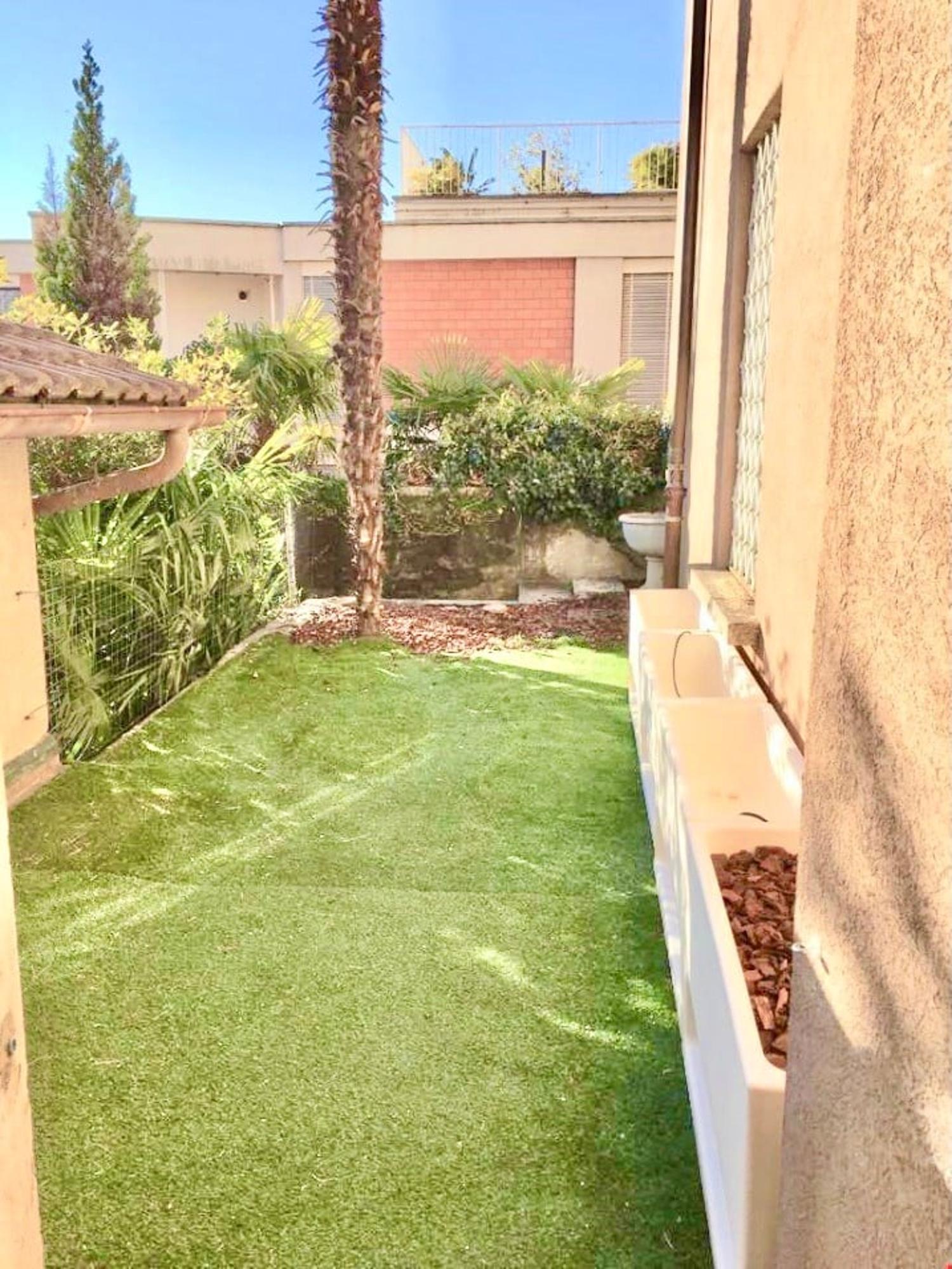 Appartamento moderno con giardino recintato
