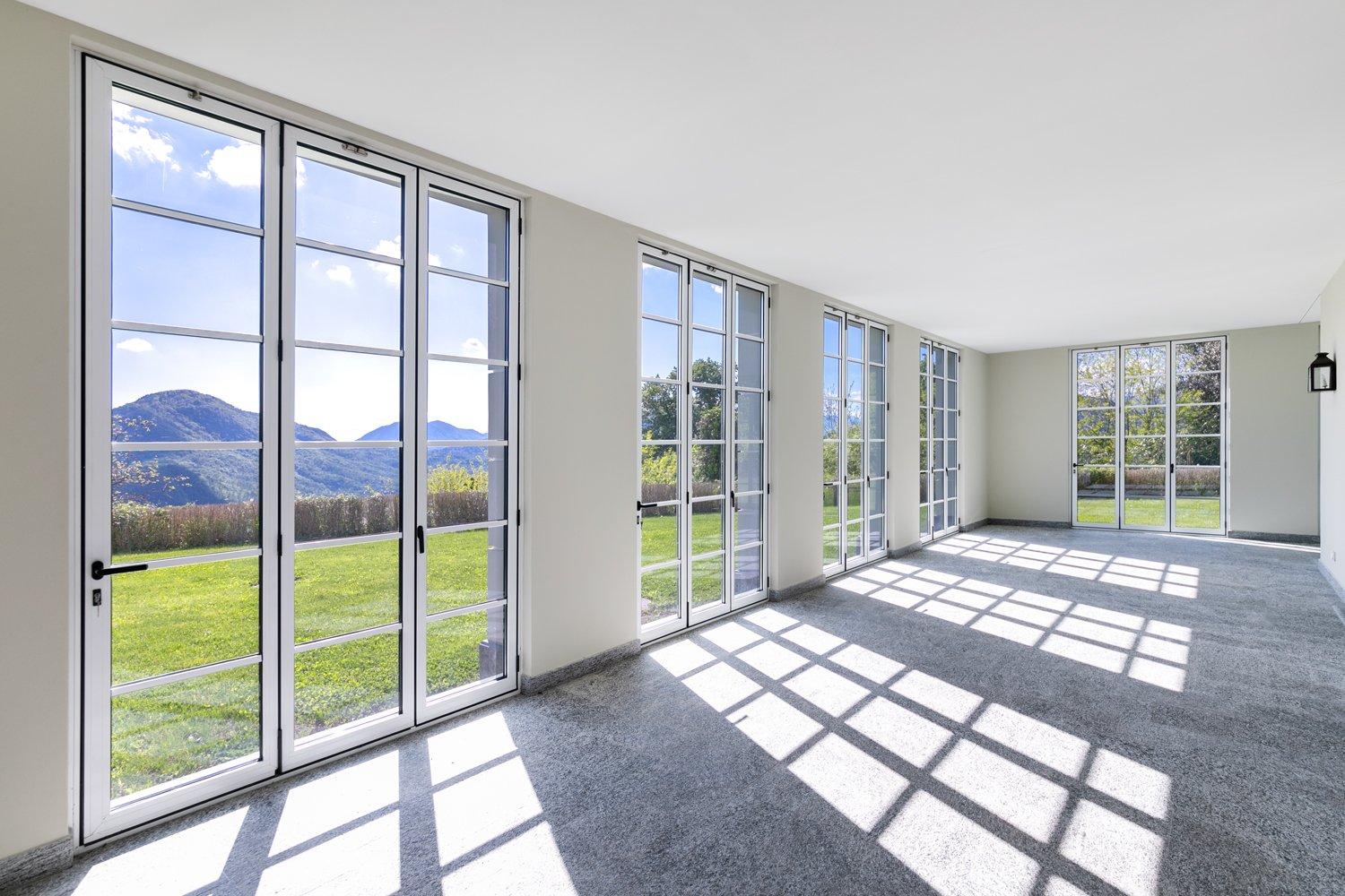 COLLINA D’ORO – AFFITTASI INCANTEVOLE APPARTAMENTO CON GIARDINO PRIVATO E VISTA LAGO (rif. 001)