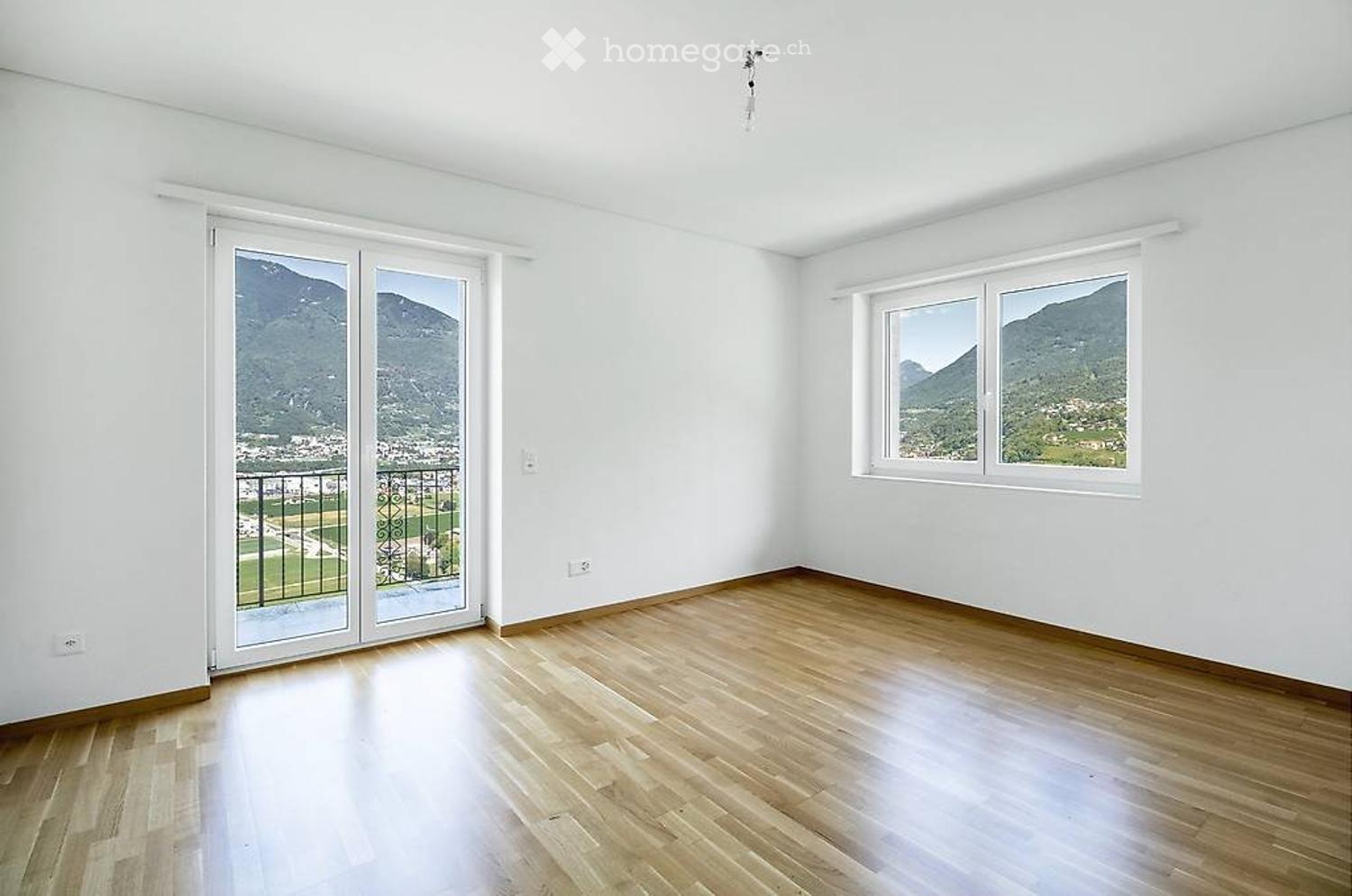 Luminoso 4.5 Locali in Casa Bifamiliare con Vista Lago