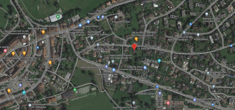 The map depicts an urban area with residential and commercial zones. There are several points of interest, including a restaurant, audio service store, children's playground, and a fire station. The residential zone features various houses and buildings,