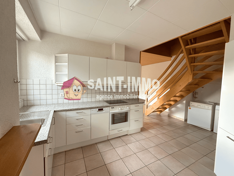 white cabinets, granite countertop, stainless steel sink, electric stove, dishwasher, washing machine, wooden staircase