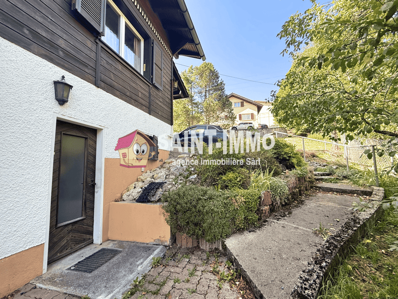Chalet de deux appartements (3 & 6.5 pièces) avec jardin arboré de 840 m2, terrasse et garages (25)