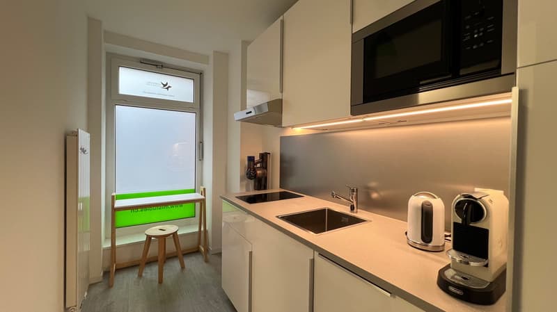 Bureau moderne avec vitrines à louer Quartier Eglise Rouge à Neuchâtel (7)