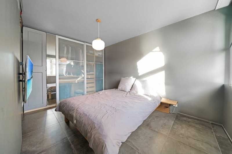 Appartamento nuovo, moderno 2.5 locali PLUS condominio con giardino (10)