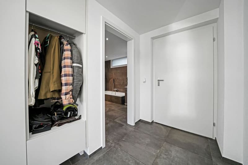 Appartamento nuovo, moderno 2.5 locali PLUS condominio con giardino (11)