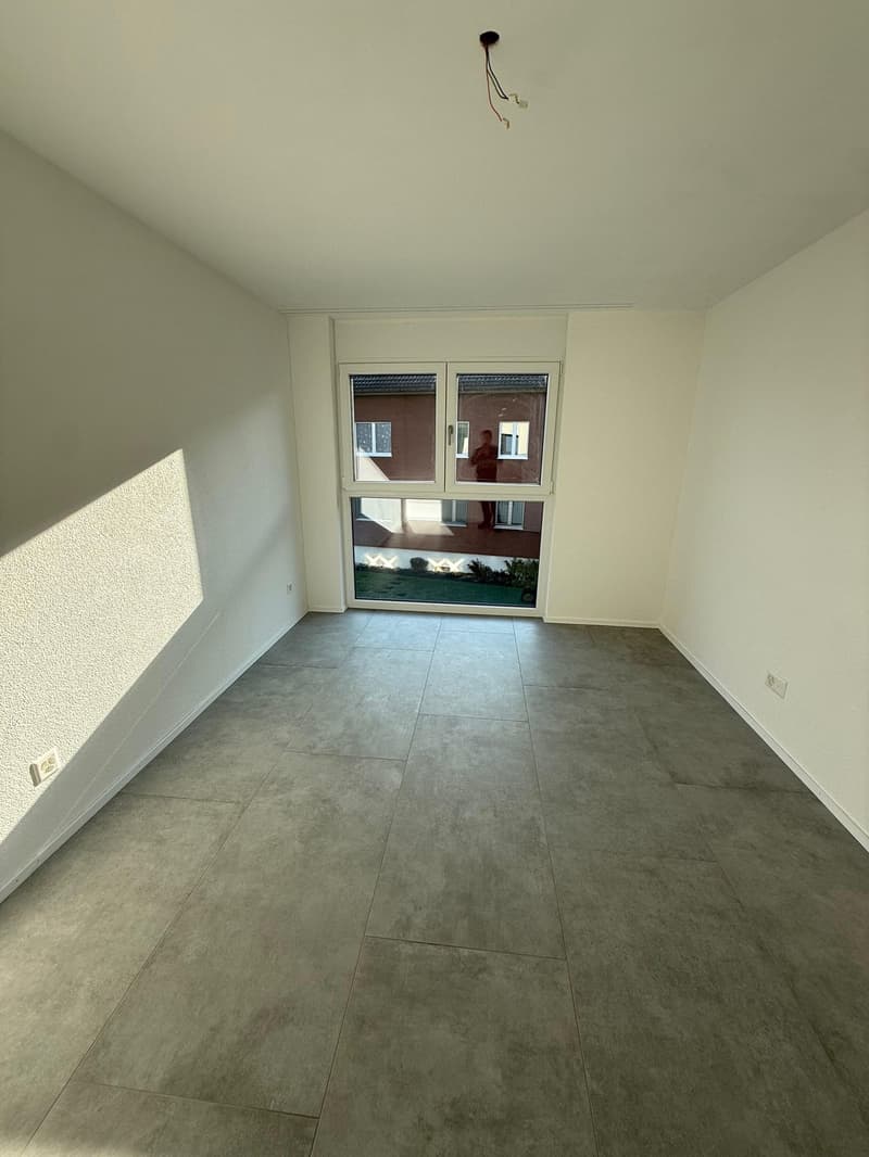 Moderne 2.5-Zimmer-Wohnung in Reinach mit Balkon und Garage (10)