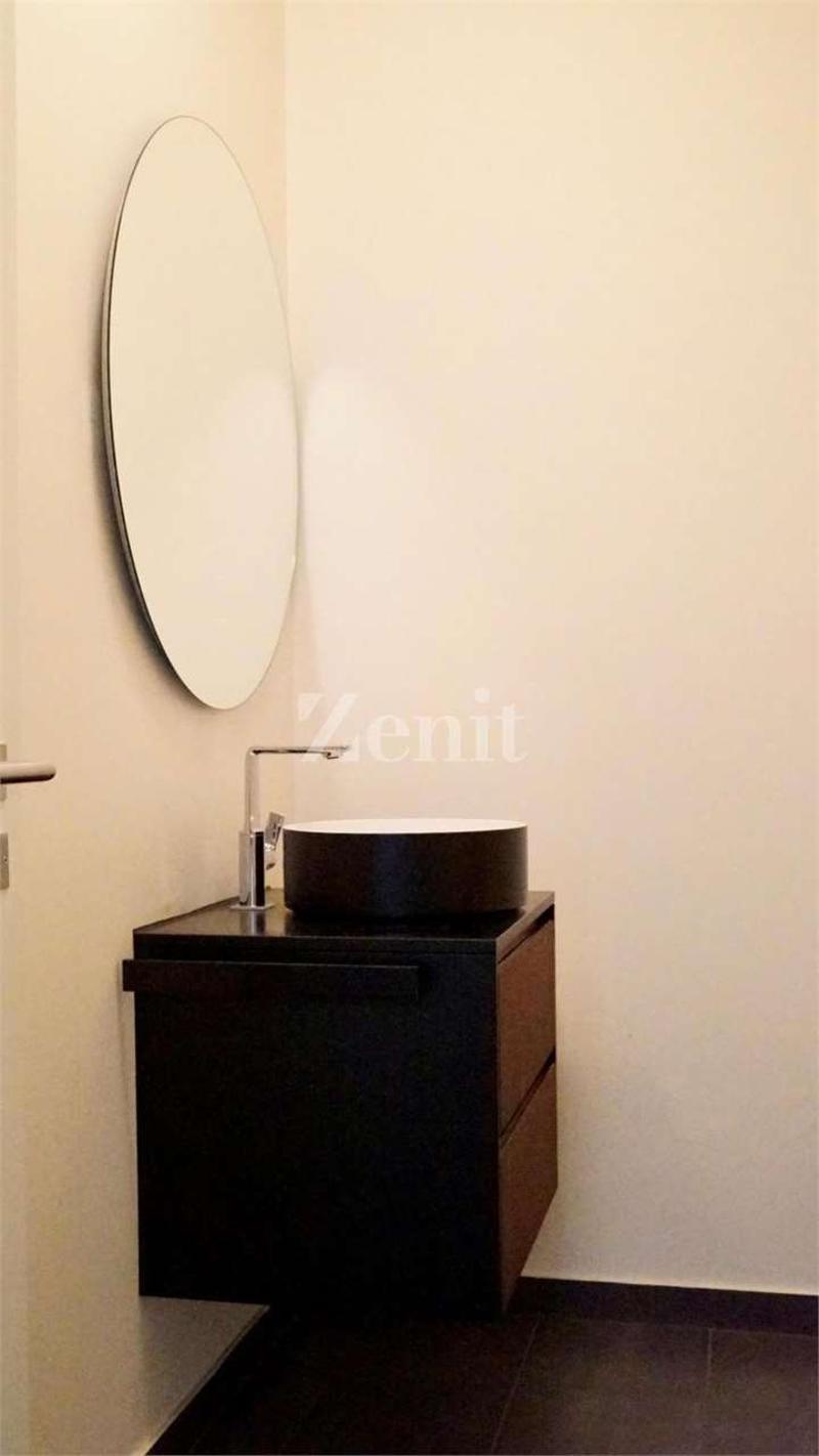 Moderno attico 2.5 locali con ampia terrazza (7)