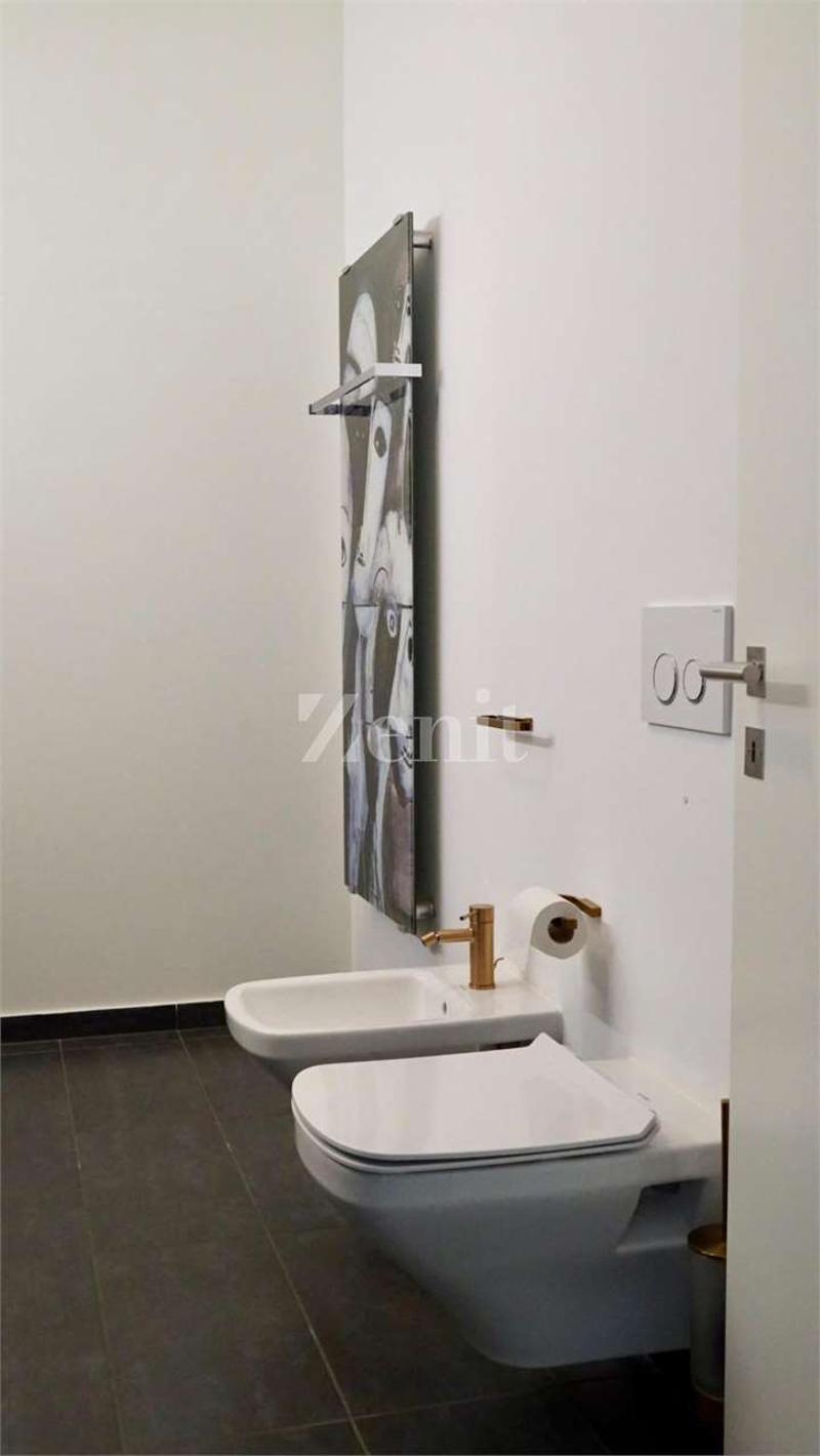 Moderno attico 2.5 locali con ampia terrazza (10)