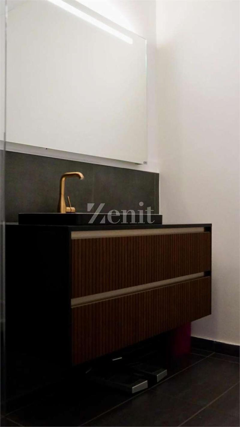 Moderno attico 2.5 locali con ampia terrazza (8)