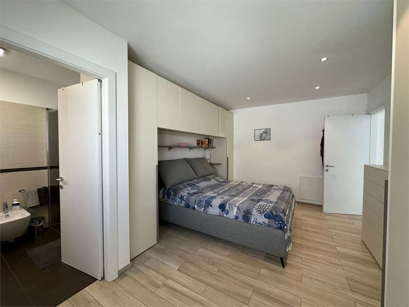 Elegante appartamento 4.5 locali con giardino a Cadempino. (4)
