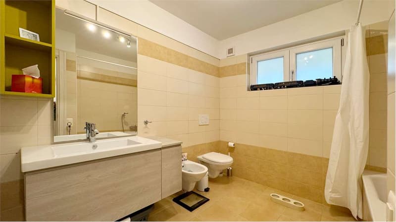 Appartamento in vendita da 2.5 locali con giardino privato (8)