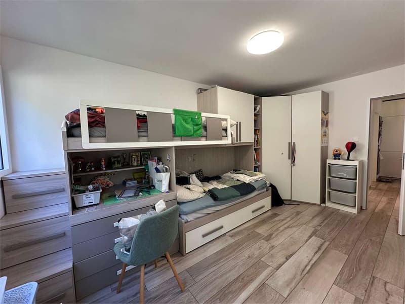 Raffinato appartamento 3.5 locali con giardino privato a Sorengo (7)