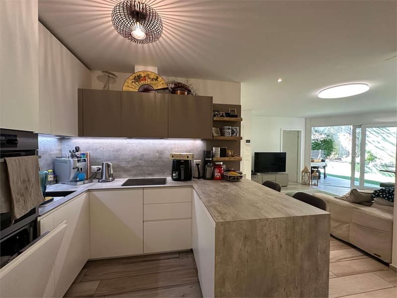 Raffinato appartamento 3.5 locali con giardino privato a Sorengo (5)