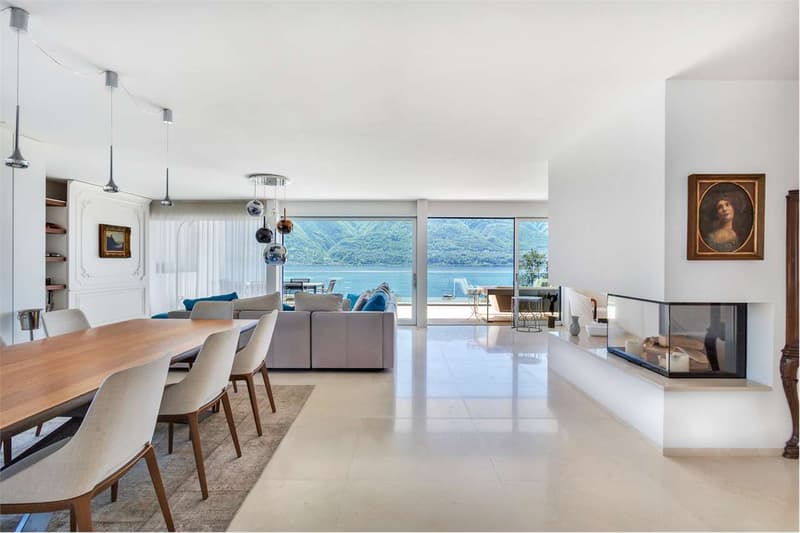 Meraviglioso appartamento attico di 6.5 locali con vista lago a Minusi (1)