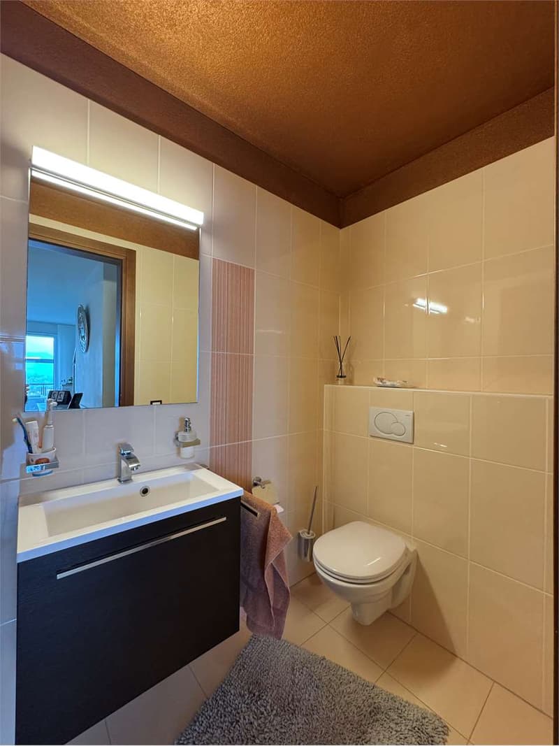 Villa a schiera triplex di 4.5 a Pura con vista lago immersa nel verde (7)