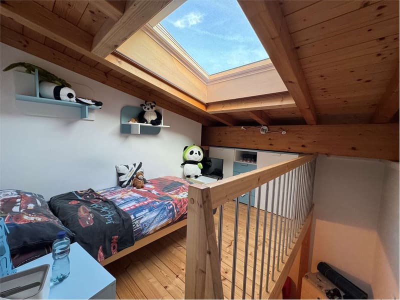 Villa a schiera triplex di 4.5 a Pura con vista lago immersa nel verde (10)