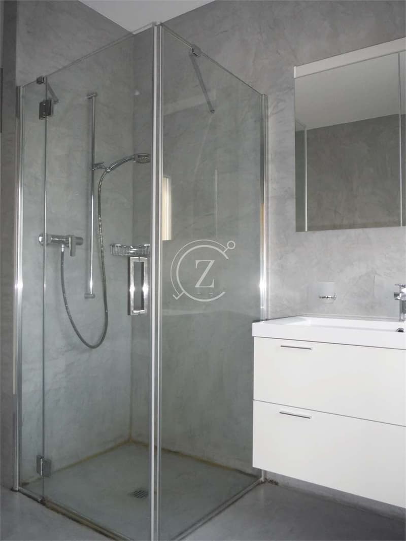 Elegante attico di 3.5 locali con vista panoramica e piscina condomini (13)