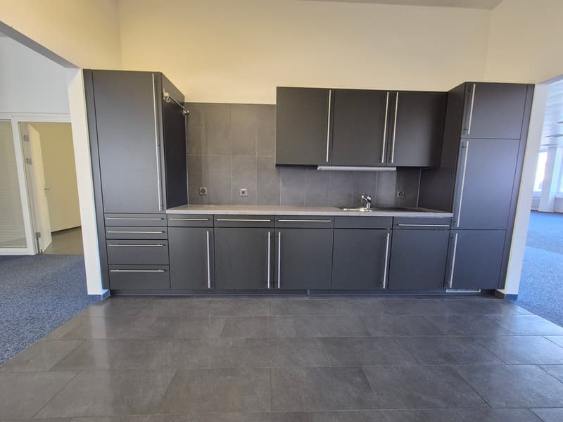 modern kitchen, grey cabinets, tile floor, faucet, sink, power outlets