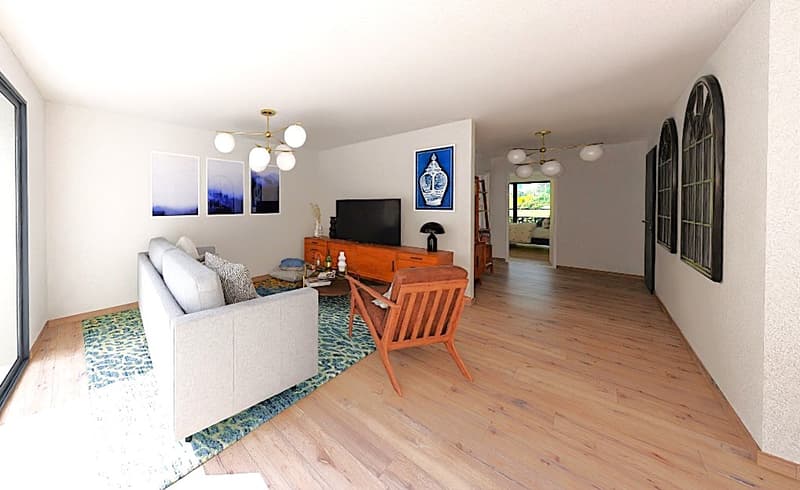 white walls, wooden floor, glass door, light fixtures, sofa, TV stand, armchair, decorative items