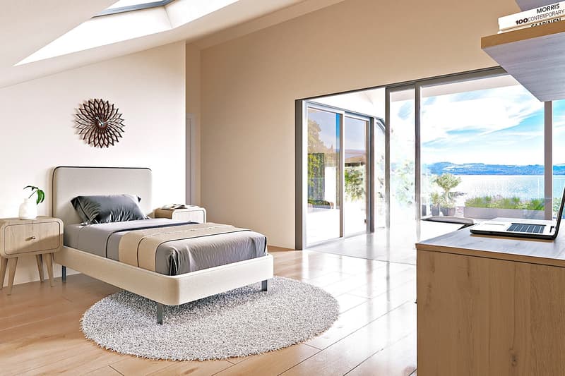 bedroom with bed, nightstands, rug, sliding glass doors, view of lake