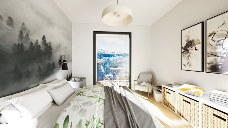 A cozy bedroom with a bed adorned with green leaf-patterned bed linen, a balcony with an outdoor table and chairs, a wall with artistic wall coverings, and a ceiling lamp. The room features a bedside table with a lamp, and there are several pillows on the