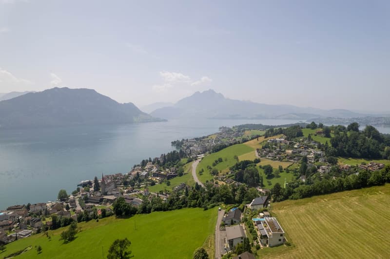 Lake, mountains, village, houses, road, fields, swimming pool