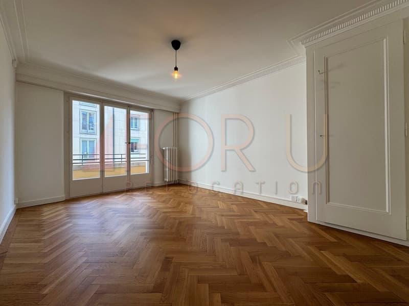Bel appartement en angle de 3 pièces rafraîchi aux Pâquis (1)