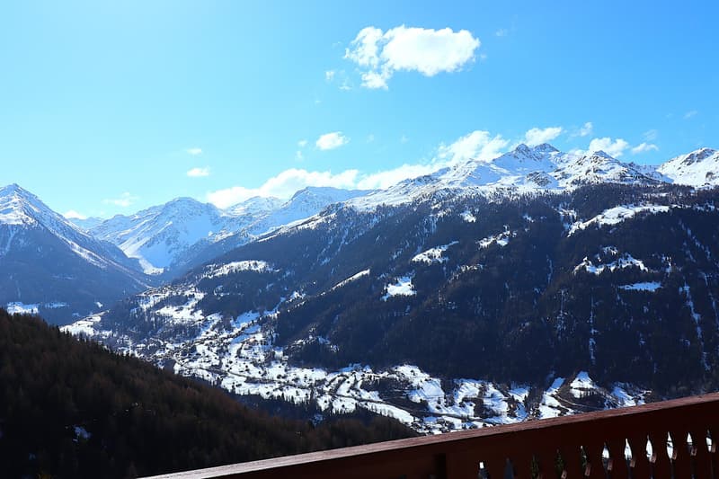 Outdoor view, balcony, snowy mountains, blue sky