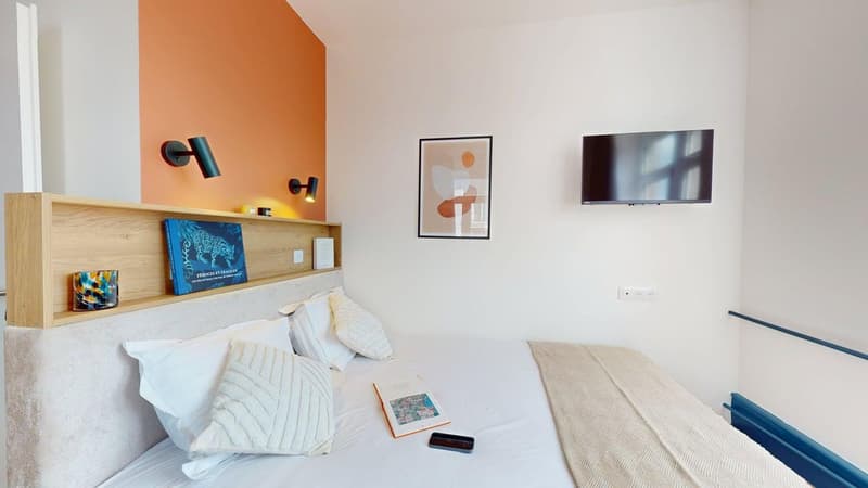 bed, white walls, bedside shelf, mounted picture frame, TV