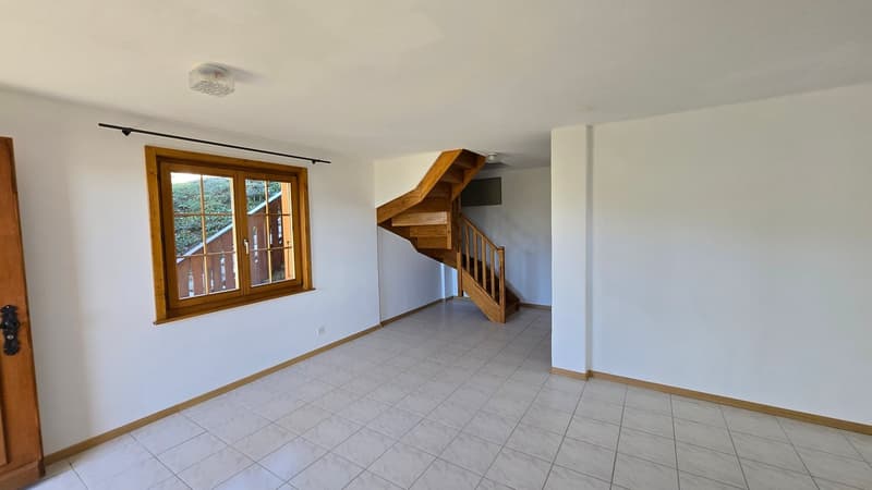 Entrance hall, tiled floor, wooden stairs, window with wooden frame, wooden door, modern interior