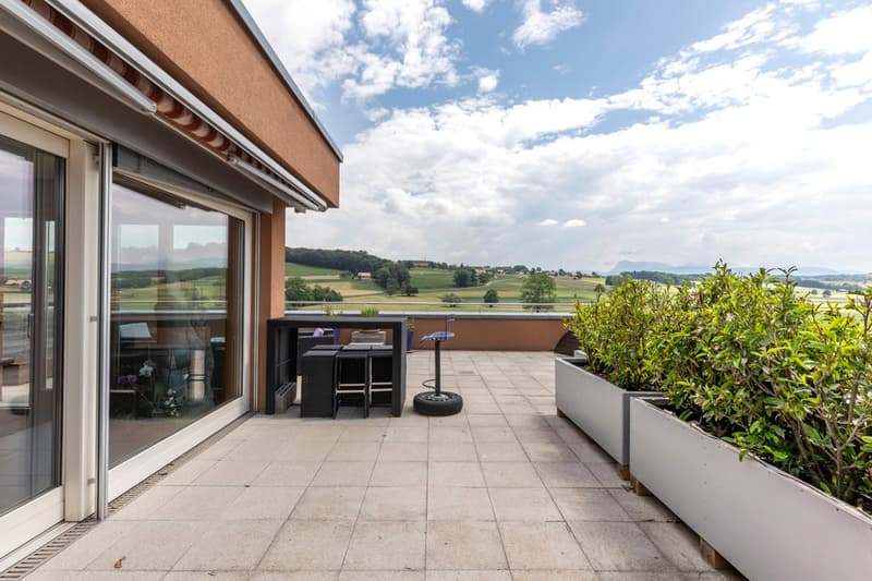 covered terrace, outdoor seating, tile flooring, views of landscape