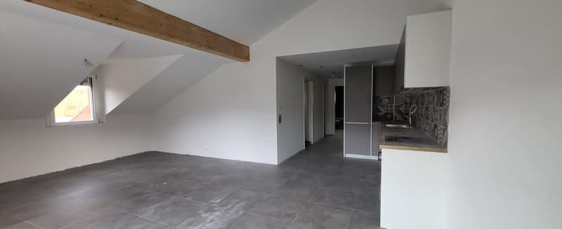 empty room, white walls, gray tiles, wooden beam, window, kitchen area