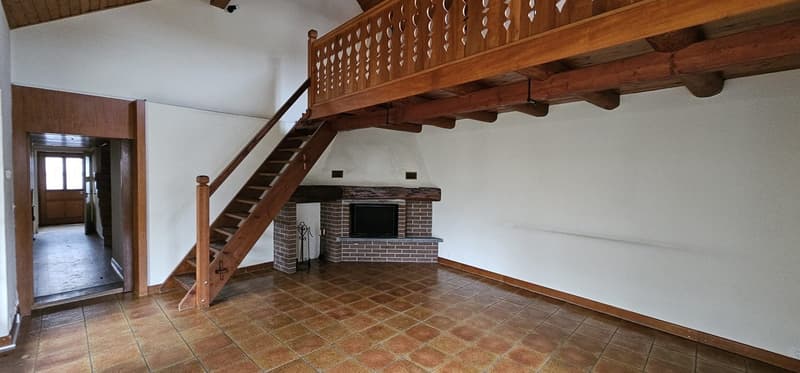 wooden stairs, fireplace, tiled floor