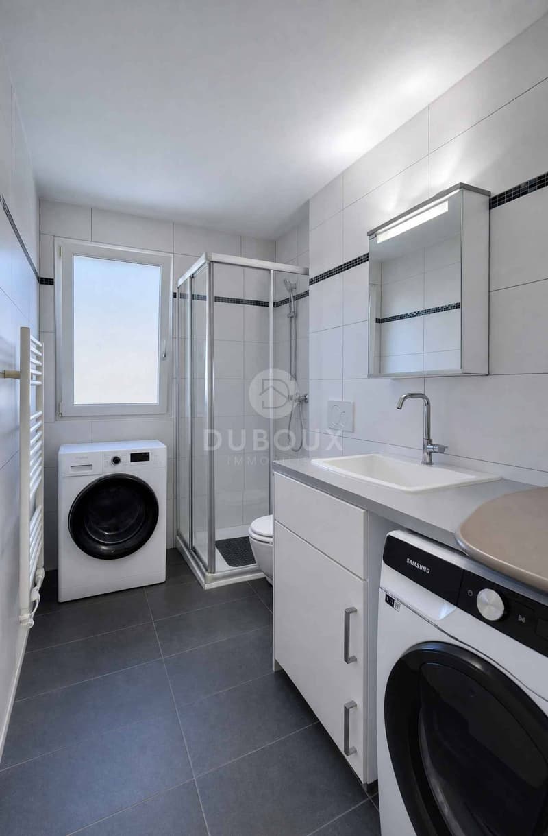 DUPLEX LUMINEUX DANS UN CADRE VERDOYANT (11)