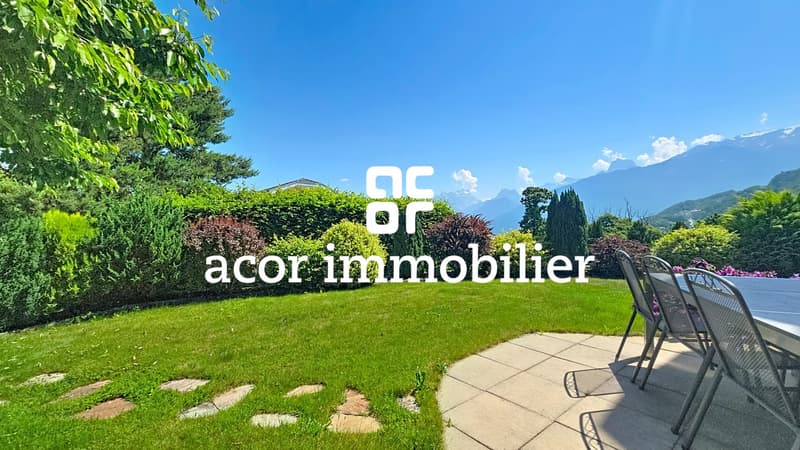 Villa aux volumes spectaculaires face aux Alpes (7)