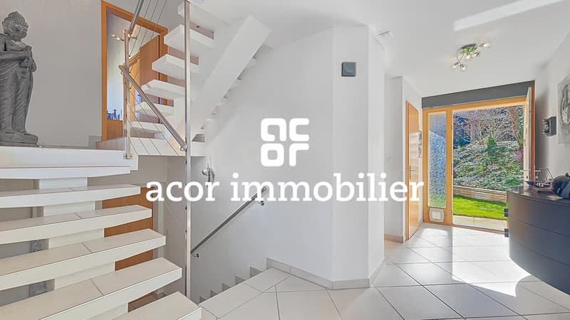 Villa aux volumes spectaculaires face aux Alpes (6)