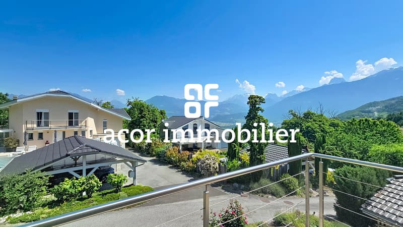 Villa aux volumes spectaculaires face aux Alpes (5)