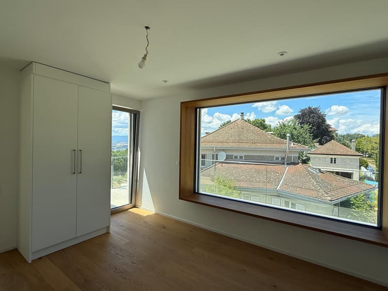 2.5 pièces en attique avec grande terrasse et vue sur le lac (7)