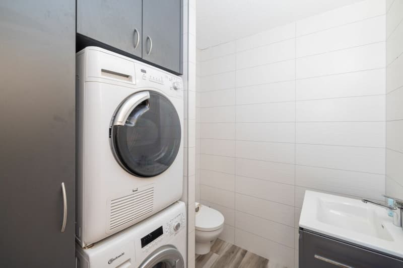 Spacieux 3 pièces 1/2 en rez-de-jardin de 107 m² (16)